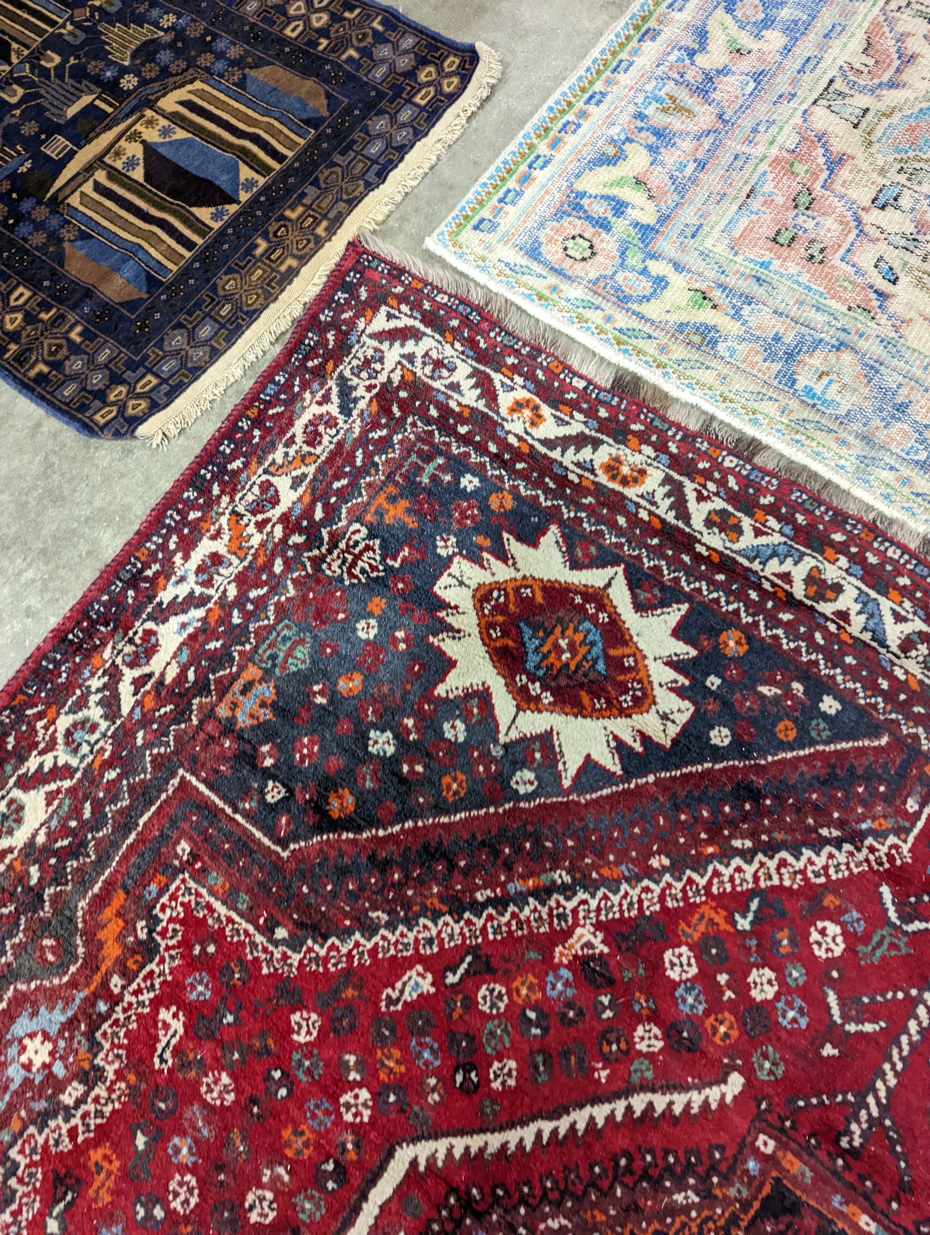 A North West Persian red ground carpet, 335 x 220cm